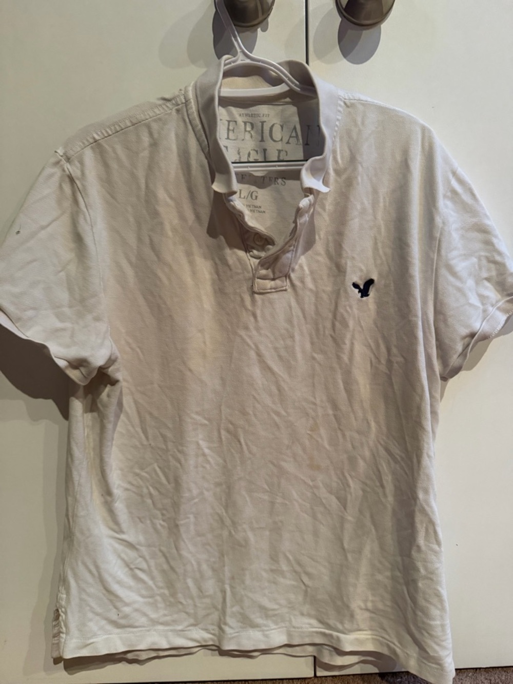 American Eagle Outfitters Men’s Off-White Polo with Navy Logo